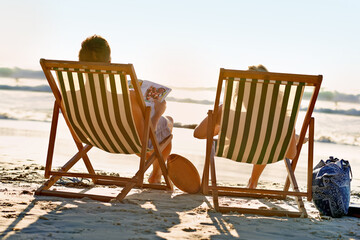 Back, chair or couple at beach to relax for holiday, vacation or anniversary romance in summer....