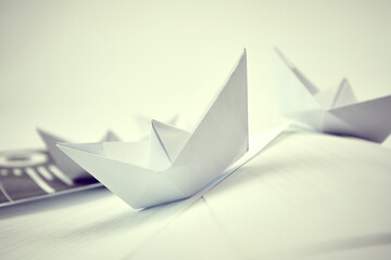 paper boats on the paper - 783064215