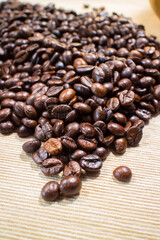 coffee beans in the spoon - 783065251