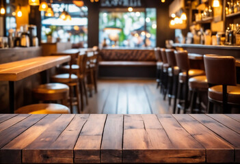 Wood table on blur of cafe coffee shop bar background can used for display or montage your products