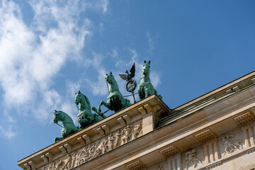 Fototapeta na wymiar Statue of cavalry located on the Brandenburg Gate. Brandenburg Gate close-up.