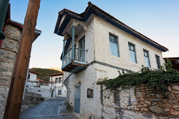 Old abandoned house of traditional architecture at the village of Mesoropi in northern Greece