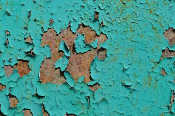 Close-up of peeling paint on wall. Background, texture, interior design concepts, shabby vintage...