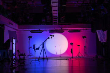 Neon Glow on Set: Silhouette of Film Production Gear Backstage shot.