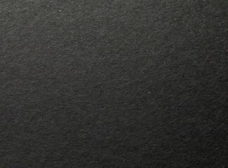 Sheet of black paper texture background