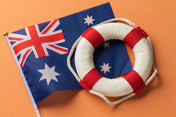 Australia flag and lifebuoy on a colored background, concept on the theme of help