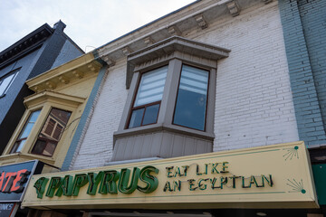 Fototapeta premium exterior building and sign of Papyrus, an Egyptian restaurant, located at 337 Danforth Avenue in Toronto, Canada