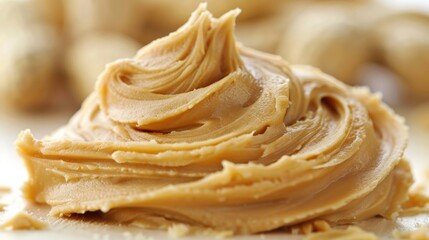 A close up of a pile of peanut butter on top of something, AI