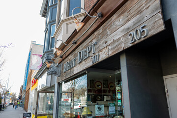 Fototapeta premium general view of Danforth Avenue with The Meat Department East, a butcher shop, located at 207 Danforth Avenue in Toronto, Canada