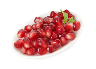 Ripe juicy pomegranate grains in bowl isolated on white