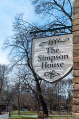 Fototapeta premium projecting sign outside The Simpson House at Riverdale Farm in Toronto, Canada