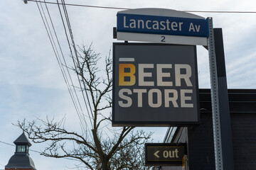 Obraz premium exterior projecting sign of The Beer Store located at 534 Parliament Street (at Lancaster Avenue) in Toronto, Canada