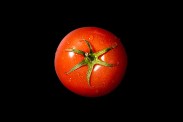 Fresh tomato on a black background, top view. Organic food - 783113672