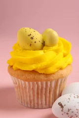 Gordijnen Tasty cupcake with Easter decor on pink background, closeup © New Africa