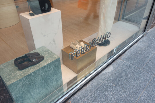 exterior display window, sign, and merchandise of Ferragamo, a shoe store, located at 131 Bloor Street West in downtown Toronto, Canada
