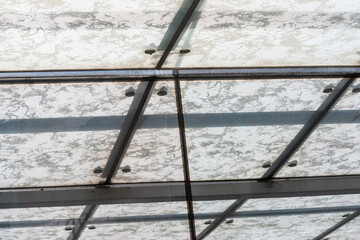 abstract metal and frosted glass canopy structure