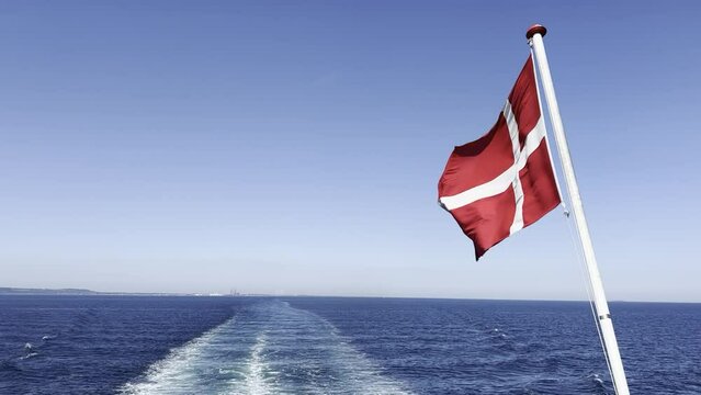 Seafaring: The Danish flag flies on a RoRo ship heading east from the sea port in Frederikshavn