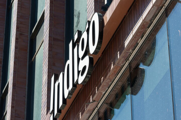 Fototapeta premium exterior building and sign of Indigo The Well (a book store) located at 486 Front Street West in Toronto, Canada