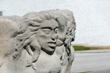 Obraz premium stone sculpture (The Harpies) by E B Cox installed at Garden of the Greek Gods (Exhibition Place, Toronto, Canada)