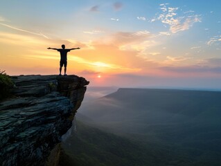 Silhouette Man Standing Arms Outstretched Cliff Edge Sunset Landscape Panoramic View Nature...