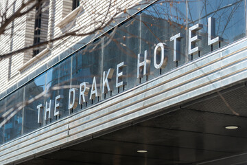 Fototapeta premium exterior building facade and sign of The Drake Hotel, a three star hotel, located 1150 Queen Street West in Toronto, Canada