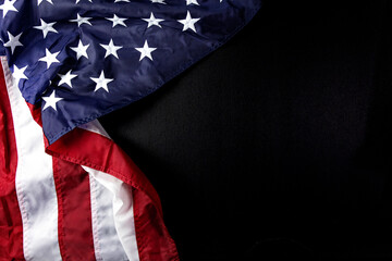 American flag on left side of the background, black texture 