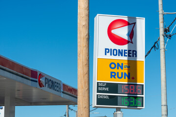 Fototapeta premium exterior road sign of Pioneer - Gas Station located at 1292 Dupont Street in Toronto, Canada