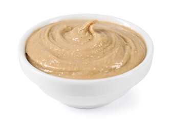Delicious nut butter in bowl isolated on white