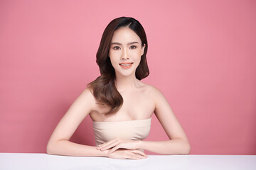 Obraz na płótnie Canvas Beautiful young asian woman with clean fresh skin on pink background, Face care, Facial treatment, Cosmetology, beauty and spa, Asian women portrait.