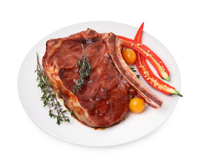 Raw marinated meat with thyme, chili pepper and tomatoes isolated on white
