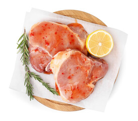 Board with raw marinated meat, lemon and rosemary isolated on white, top view