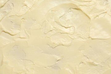 Texture of fresh natural butter as background, top view