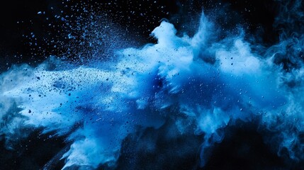 Blue powder explosion isolated on black background