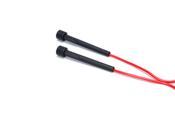 red black skipping rope isolated on white background