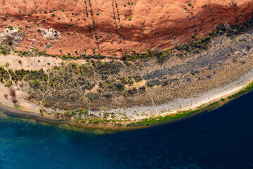 Aerial view of Colorado river and its shore at Horseshoe Bend in Page, Arizona, USA. Camp ground,...