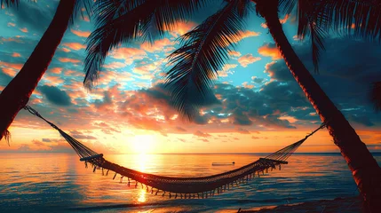 Schilderijen op glas Silhouette of a hammock between palm trees at sunset on a beach © bmf-foto.de
