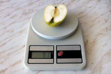 apple on the scale