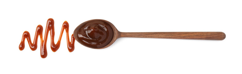 Tasty barbecue sauce and spoon isolated on white, top view