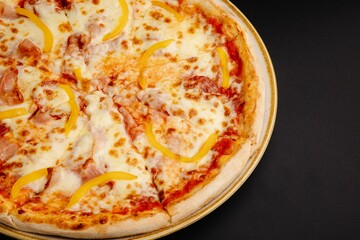 Pepperoni and Yellow Pepper Pizza on Dark Background, Ideal for Pizza Lovers and Food Enthusiasts