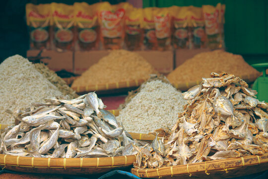Heaps of Bulad or traditional Filipino salted dried fish displayed for sale in a local market stall showing the authentic local cuisine and food heritage in the Philippines