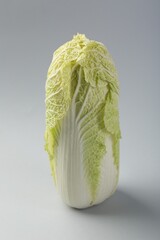 Fresh ripe Chinese cabbage on light grey background