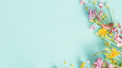 wild spring flowers on paper background - 783198271