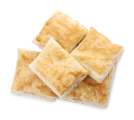 Delicious fresh puff pastries isolated on white, top view