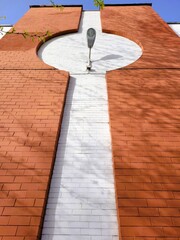 original wall, bottom view, brick, lamp, spotlight, day