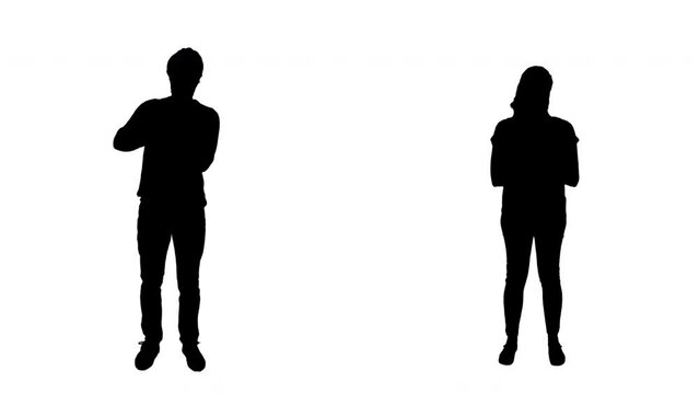 Male Female Silhouette Couple Using Hand Sanitizer Full Body Shot. Full Body portrait of a silhouette couple using a hand sanitizer. Man and a woman