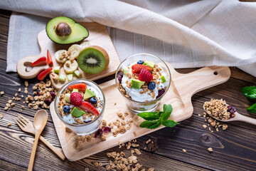 Greek Yogurt homemade with berries, avocado, banana and granola. It's healthy menu and low calories...