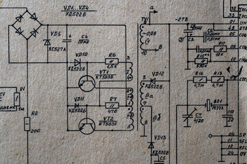 Old radio circuit printed on vintage paper electricity diagram as background. Electric radio scheme from USSR - 783215670