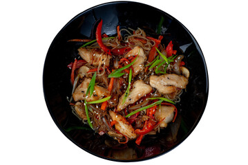 Asian wok noodles with chicken and vegetables with chopsticks on the table. - 783219869