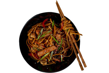 Asian wok noodles with with meat and vegetables with chopsticks on the table. - 783220032