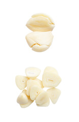 Top view set of fresh pounded garlic cloves and slices in stack isolated with clipping path in png...